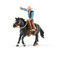 Schleich Farm Life Saddle bronc riding mit Cowboy (Schwarz, Blau, Braun)